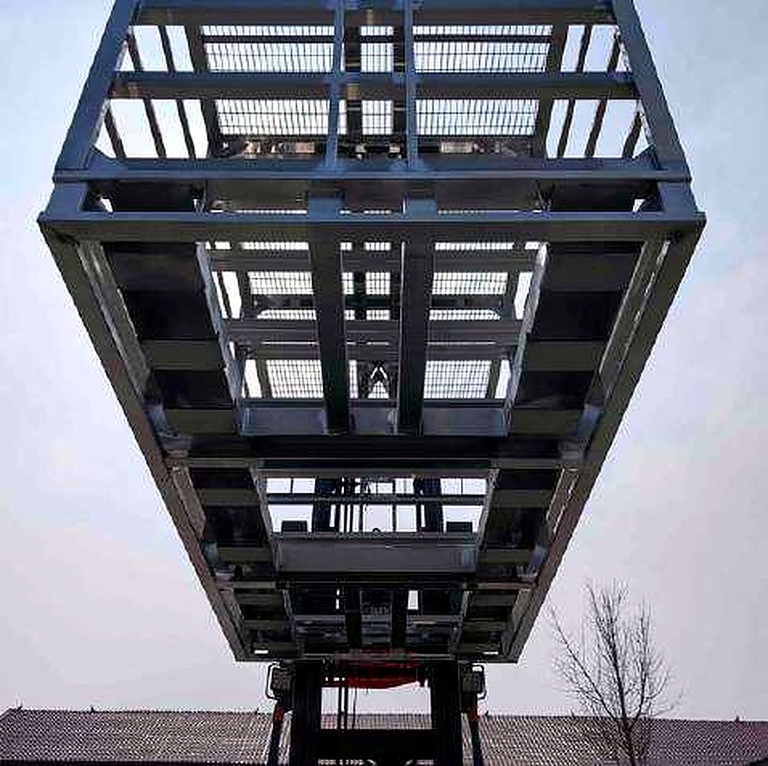 Steel cage module being handled on the factory floor