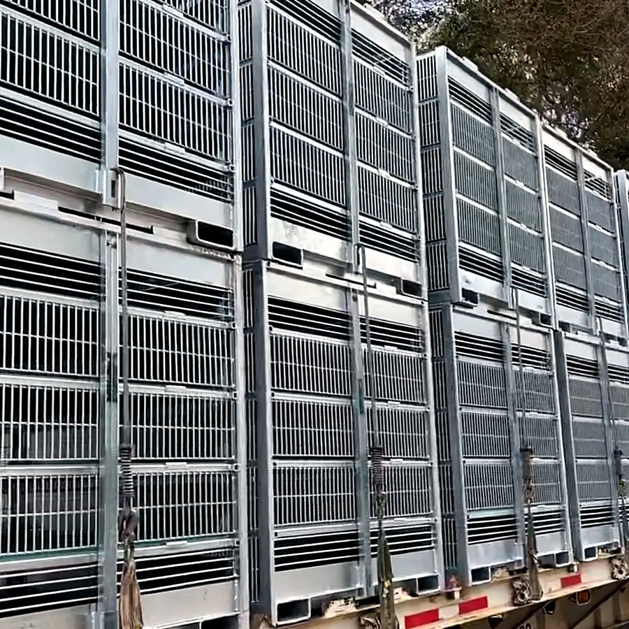 Steel cage modules loaded for transport